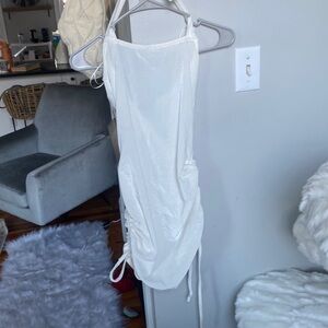 Bought at local boutique. Brand is Papermoon. NEVER WORN.